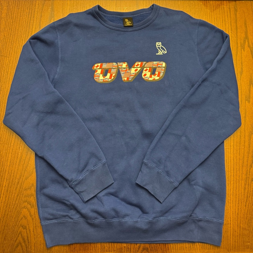 OVO blue flag logo crewneck